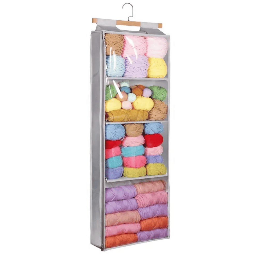 The Hanging Yarn Storage Organizer features multiple shelves for colorful yarn balls, neatly arranged in a transparent zippered case with a hook for easy and tidy yarn storage.
