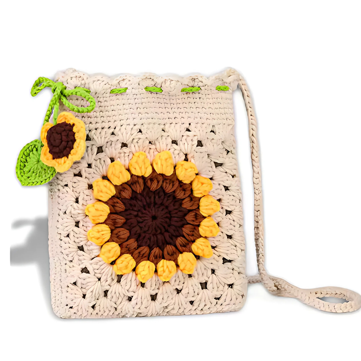 The Sunflower Crochet Bag Kit includes a small bag with a sunflower design and matching sunflower and leaf charm on the strap—an adorable floral accessory.