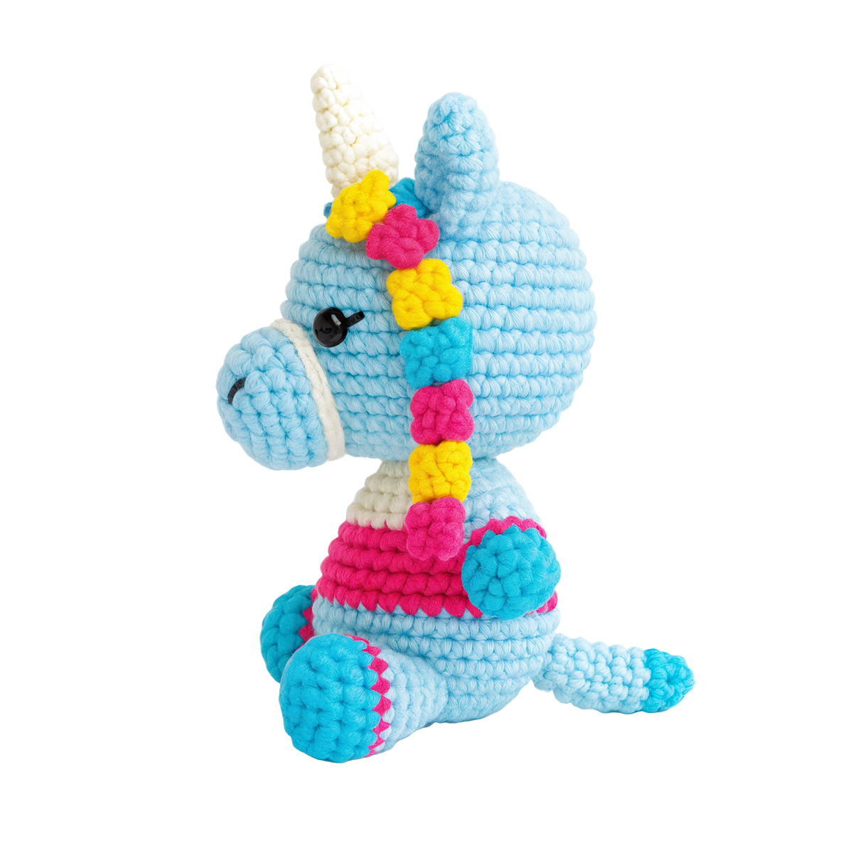 Twinkle the Unicorn Crochet Pattern: an advanced beginner crochet unicorn plush with a blue body, yellow and pink mane, white horn, and pink stripe—shown sitting upright against a white background.