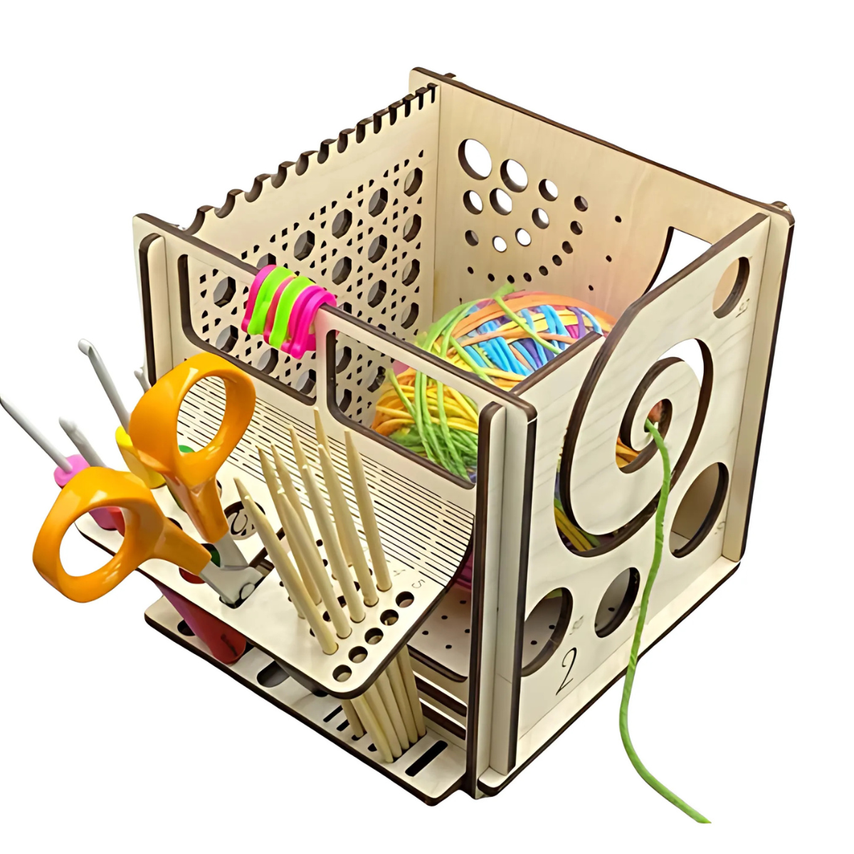 The Yarn and Tools Organizer Box stores scissors, crochet hooks, knitting needles, and colorful yarn, featuring a circular opening that lets you easily pull yarn while keeping all your crafting tools organized.