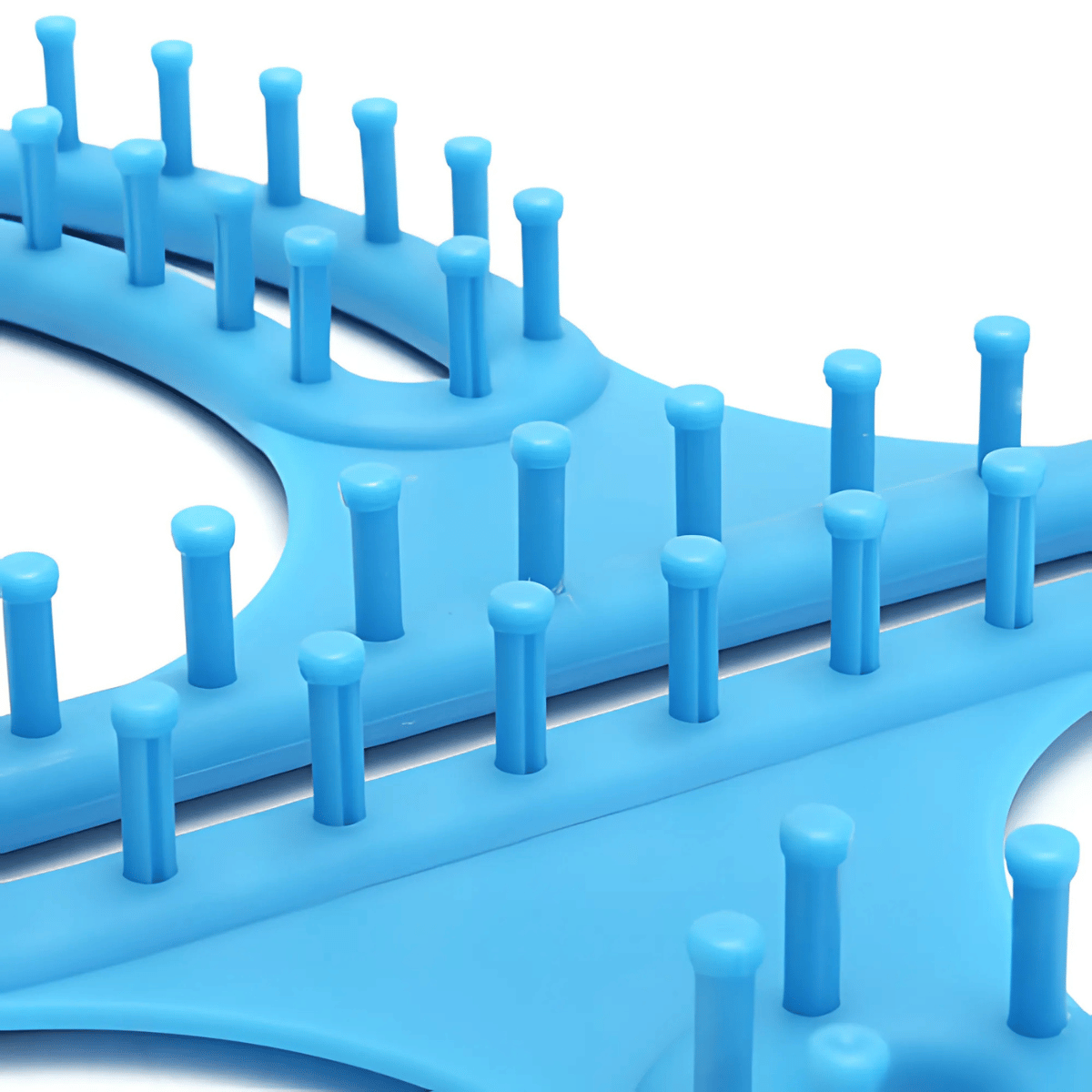 Close-up of a blue Knitting Loom for Blankets and Scarves, featuring evenly spaced upright pegs—ideal for beginners creating cozy blankets or other crafts.
