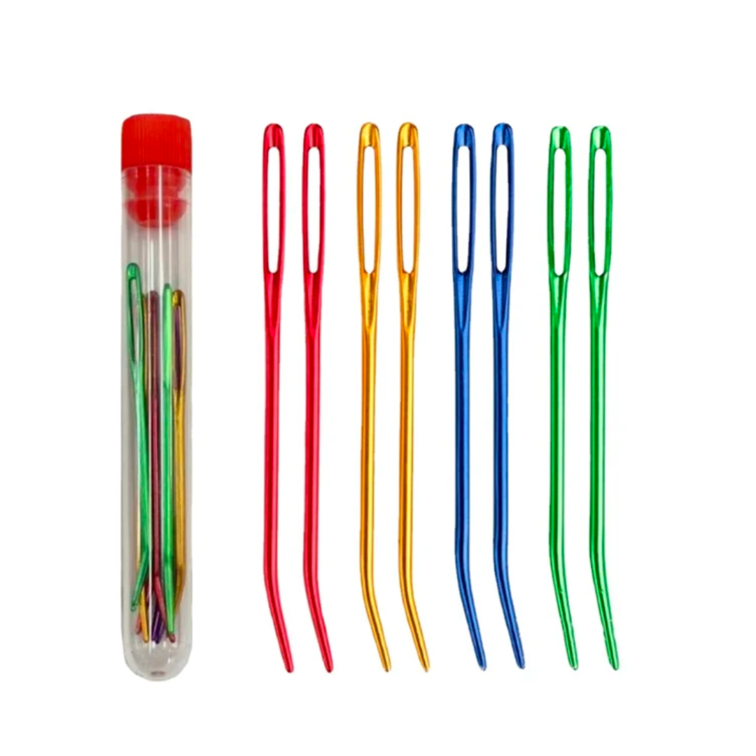This 29-piece Crocheting Kit, ideal for beginners, includes a complete set with a plastic container and colorful needle threaders. Six threaders are neatly arranged in a row: two red, two yellow, one blue, and one green.