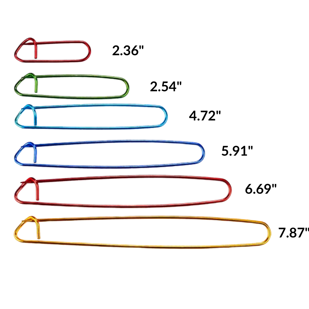 A set of six durable aluminum stitch holders, reminiscent of knitting tools, in various colors and sizes with lengths ranging from 2.36 inches to 7.87 inches.