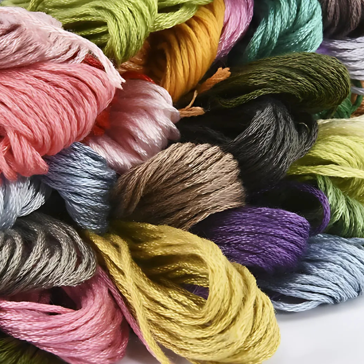 A close-up of multiple bundles from the Embroidery Floss Set, featuring colorful cotton threads arranged together—ideal for vibrant crochet projects.