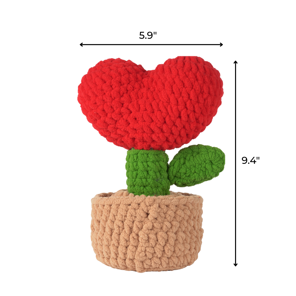 The Crochet Heart Plant Kit features a plush heart-shaped plant with one leaf in a beige pot, measuring 9.4" tall and 5.9" wide—perfect DIY crochet decor to add charm to any room.