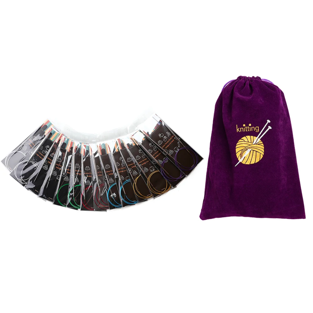 Stainless Steel Knitting Needle Set arranged in a semicircle, comes in packaging alongside a purple drawstring bag featuring a knitting graphic, ideal for all your knitting projects.