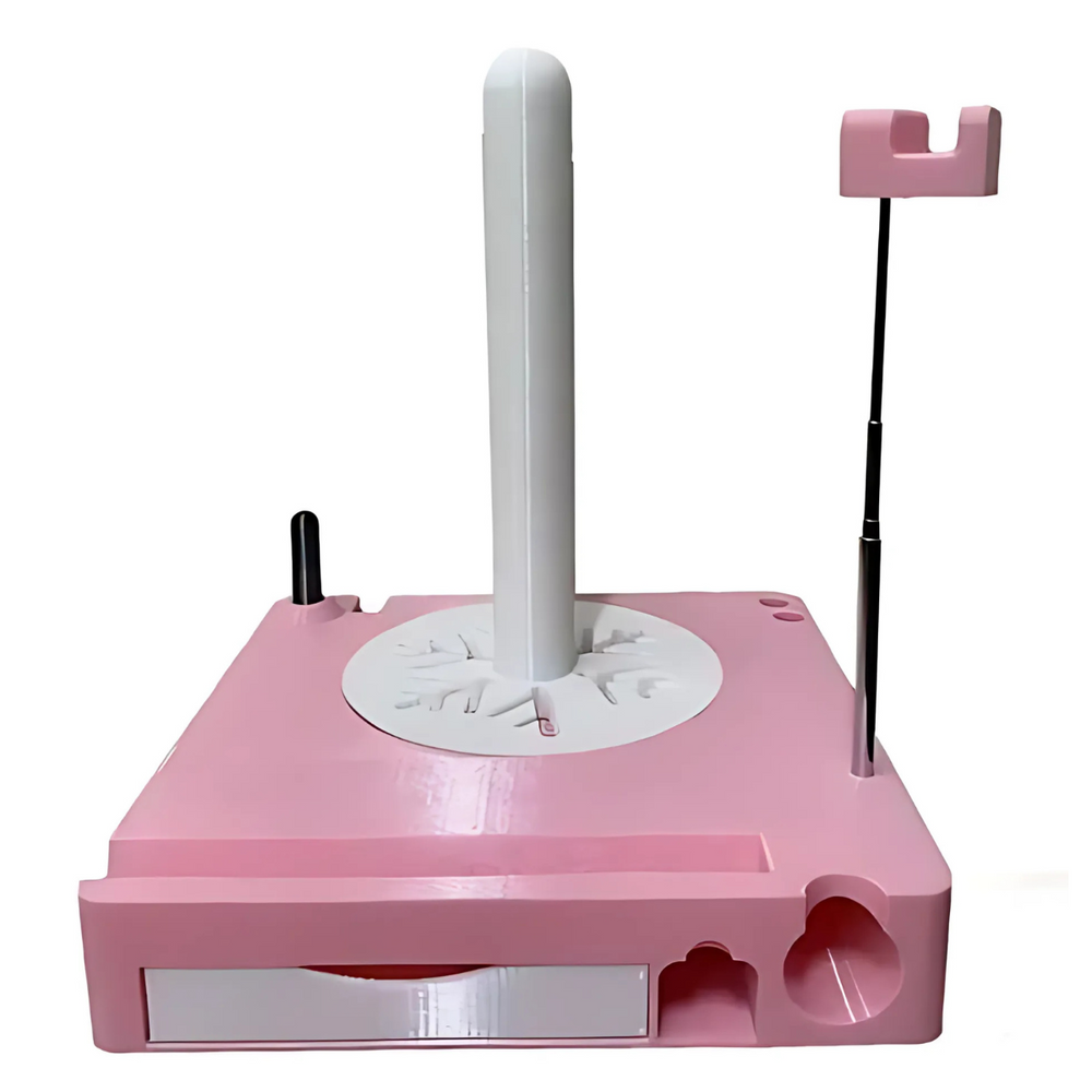 The Spinning Yarn Holder with Tool Storage is a pink and white plastic stand featuring a central vertical pole, hidden tool compartments, and a raised arm on one corner to keep yarn tangle-free.