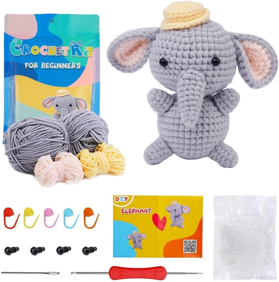 Crochet Elephant Kit includes yarn, hooks, colorful markers, stuffing, safety eyes, and step-by-step instructions to create an adorable elephant with a yellow hat—perfect for crochet beginners!.