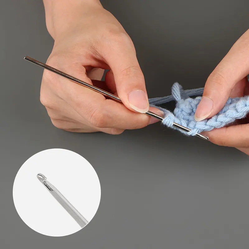 Hands crocheting with one of the Aluminum Crochet Hooks 12 Pcs using blue yarn; inset shows a close-up of the crochet hook.