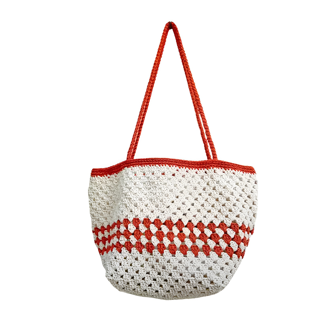 The DIY Crochet Bag Kit lets you create a handmade tote with a bold white and red pattern, two red handles, and a central horizontal red stripe—an eye-catching accessory for any outfit.