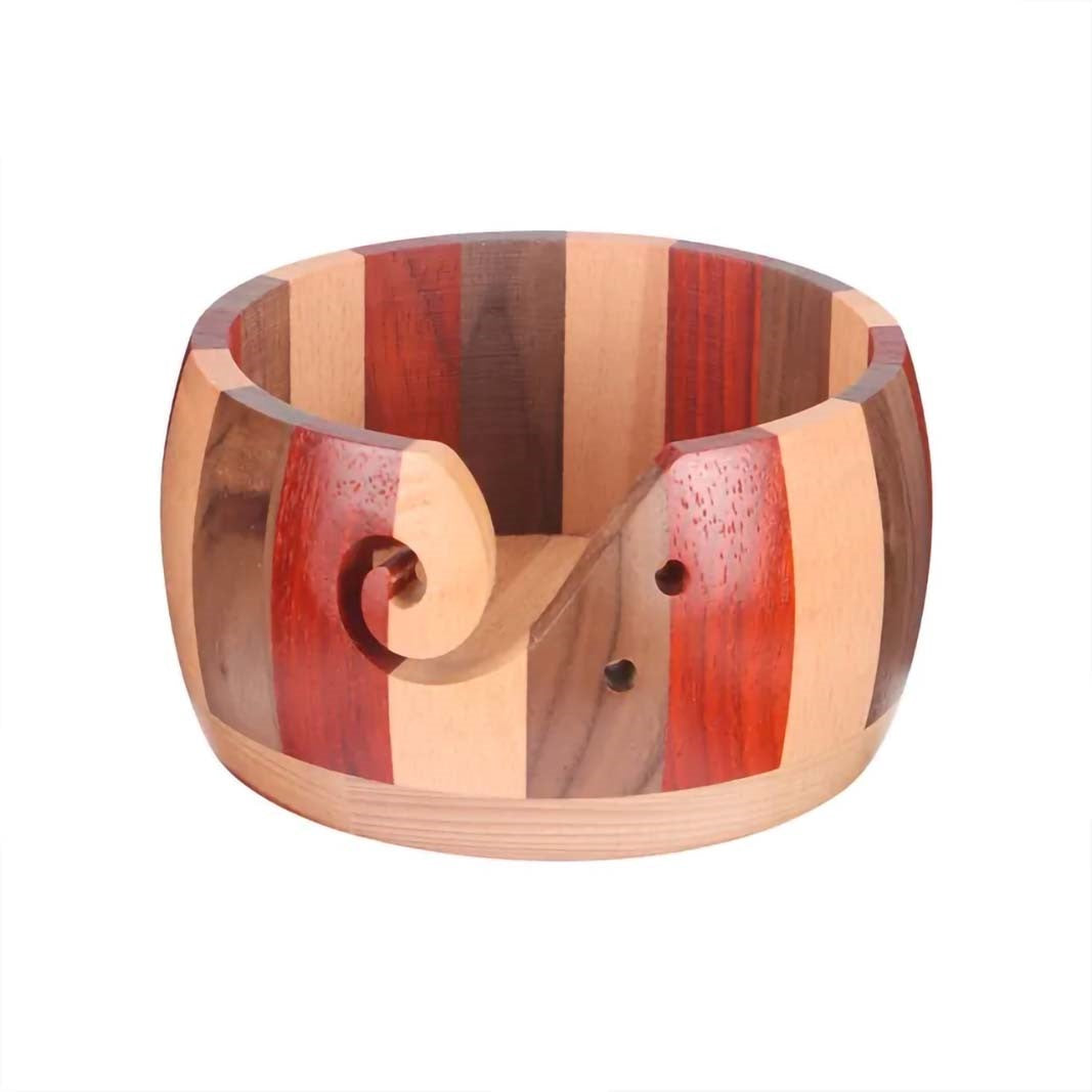 A Handmade Wooden Yarn Bowl designed with a swirl cutout and adorned with a stunning striped pattern in an array of wood tones.