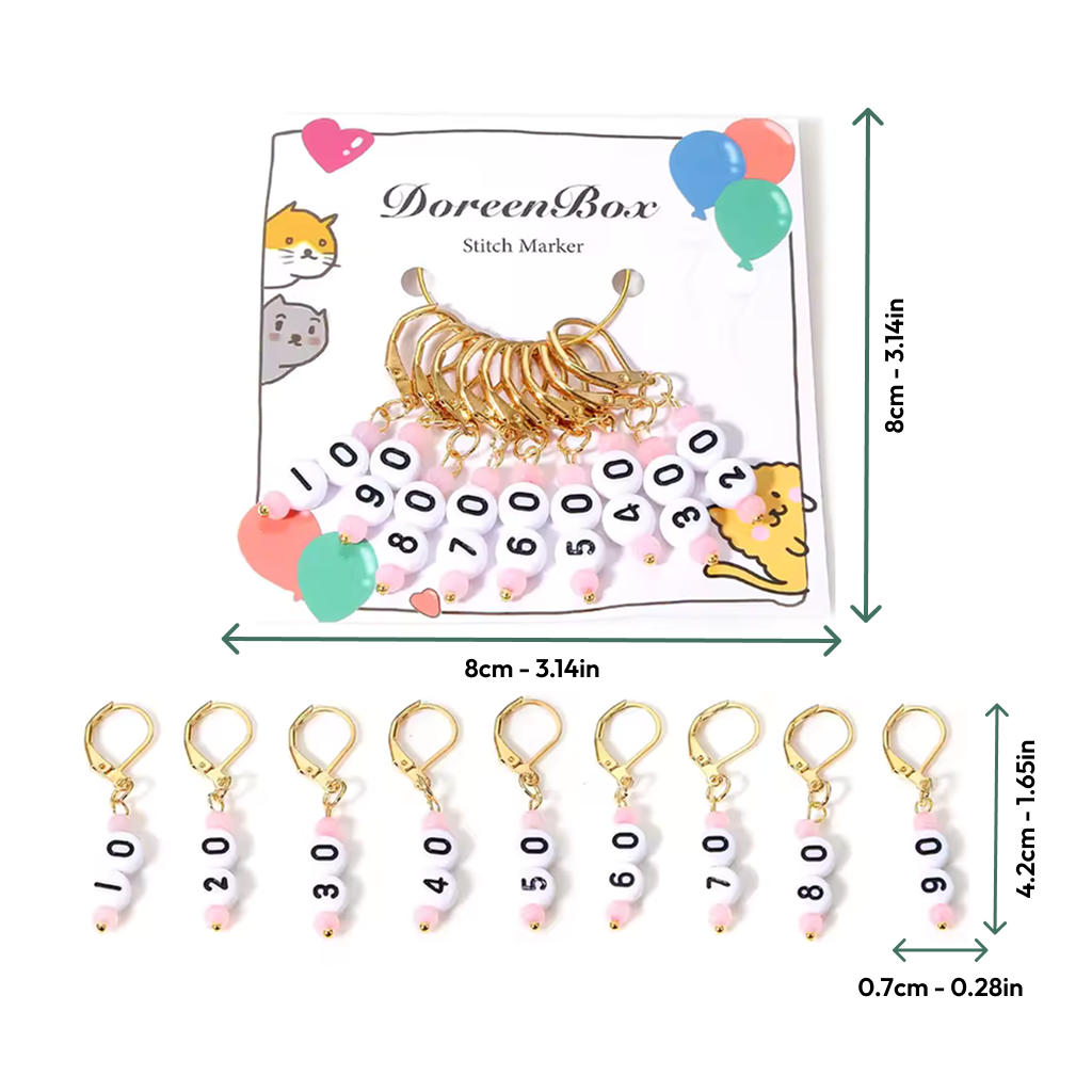 The Acrylic Numbered (10-90) Stitch Marker Set includes 9 gold acrylic markers with white numbered beads, ideal for knitting and crochet. Displayed on a card with cat illustrations. Measurements provided.