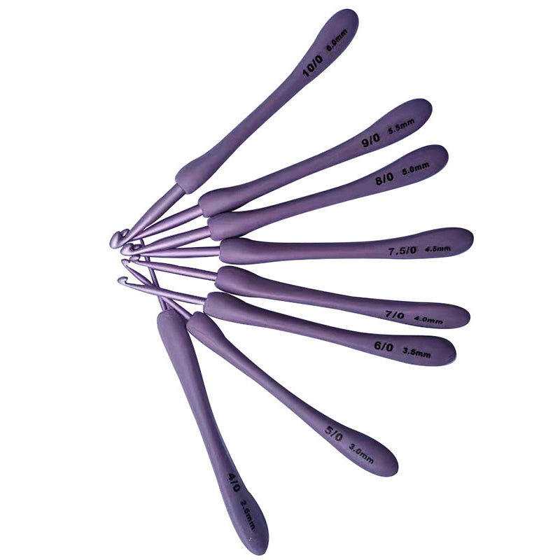 The 8 Pcs Purple Crochet Hook Set includes ergonomic hooks in a fan shape, providing a comfortable crafting experience with sizes ranging from 3.0 mm to 6.0 mm clearly printed on the handles.
