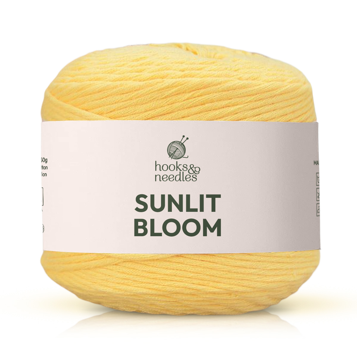 A medium weight cotton Sunlit Bloom Yarn ball with a white paper band, ideal for breathable projects.