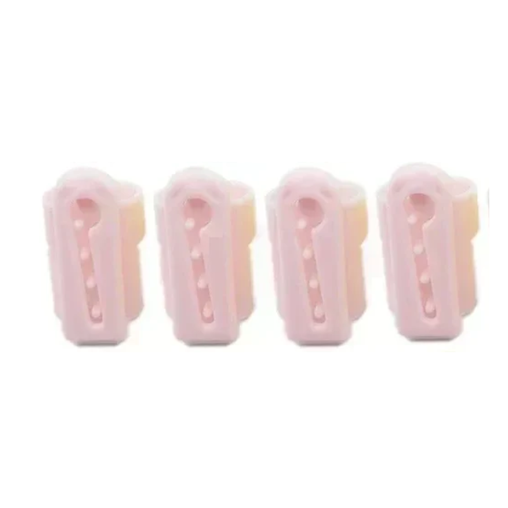 Four Yarn Finger Guides in pink plastic, shaped like keys, are lined up horizontally, resembling a whimsical accessory designed to enhance knitting efficiency.