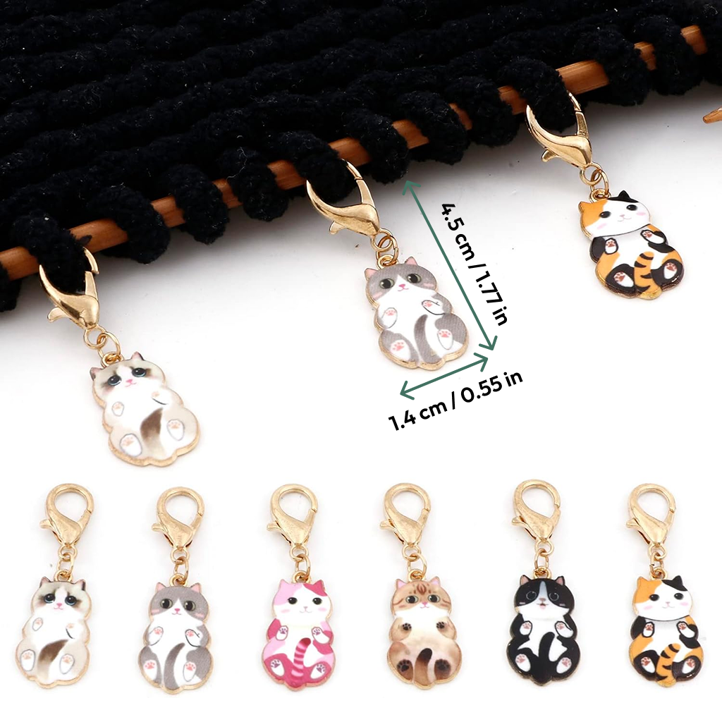 The Enamel Cat Shape Stitch Marker Set 6Pcs features gold clasp cat-shaped markers, ideal for crochet projects; each charm measures 4.5 cm x 1.4 cm.