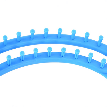 Close-up of the Knitting Loom for Blankets and Scarves featuring two blue looms with evenly spaced pegs in a curved pattern—ideal for beginners or crafting cozy blankets and scarves.
