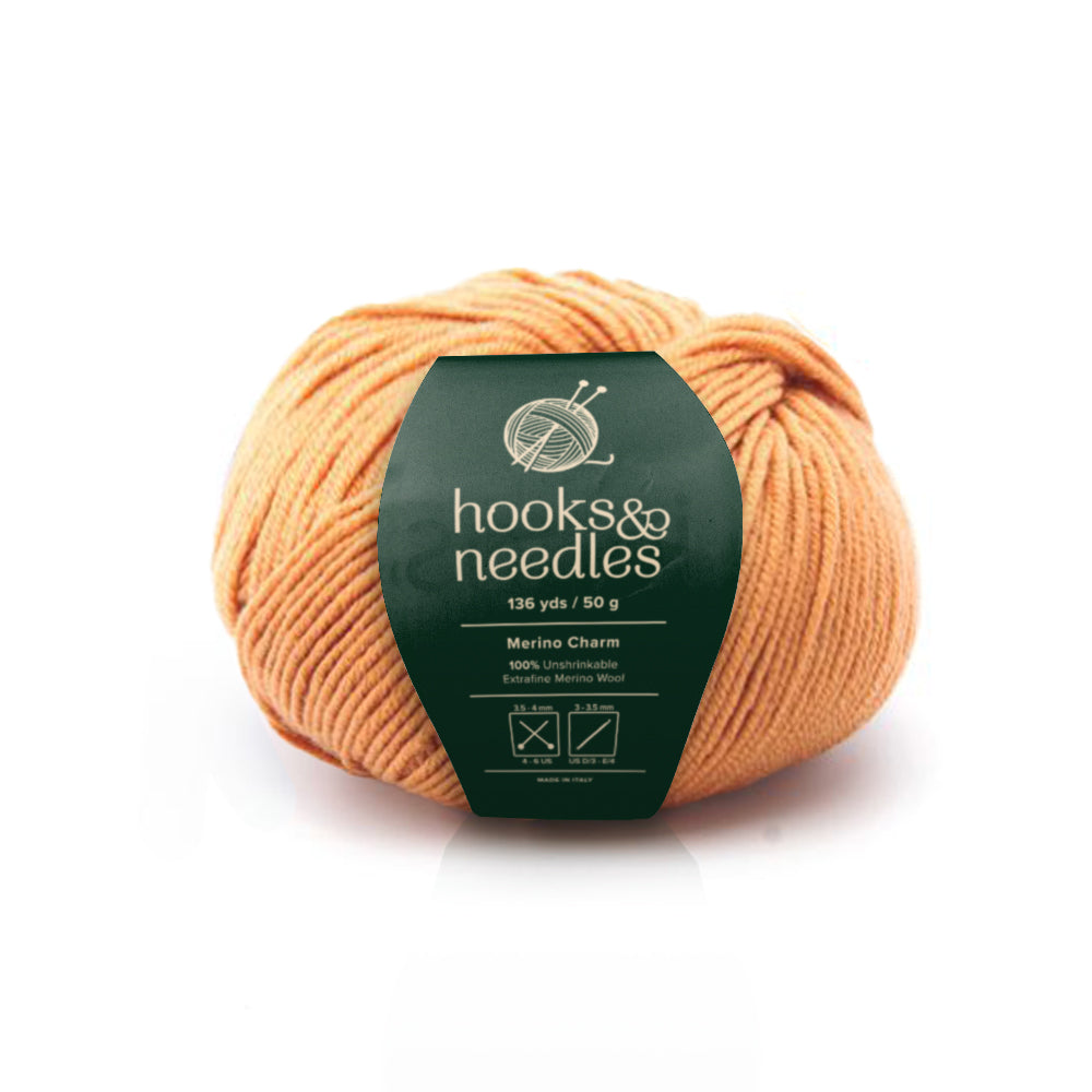 Image of Merino Charm yarn, showcasing its soft texture, ideal for creating cozy, elegant knitwear.