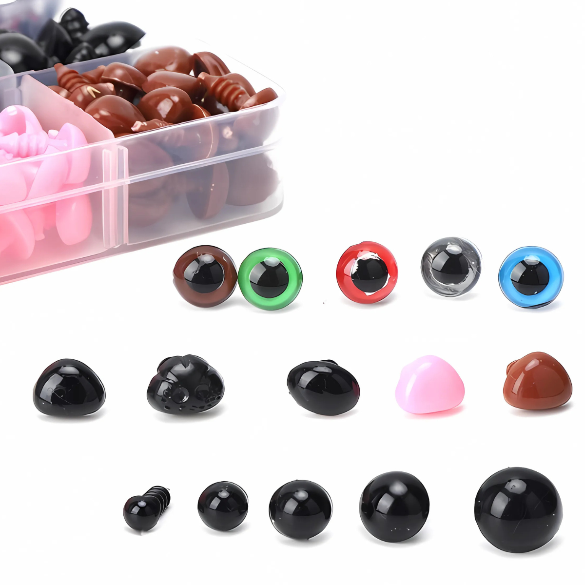 The Crafting Safety Eyes & Noses Set features assorted plastic eyes and noses in multiple colors and sizes, shown inside and outside a clear organizer box—ideal for crochet and amigurumi projects—on a white background.
