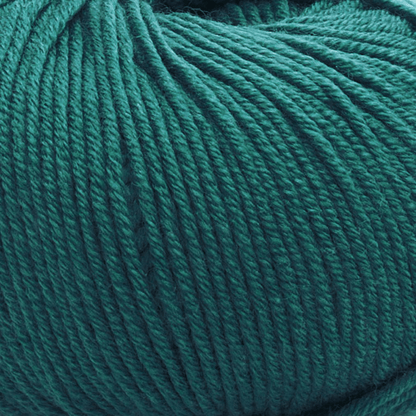 Close-up of a ball of Vintage Garden yarn in teal, showing its medium weight, texture, and tightly wound strands.