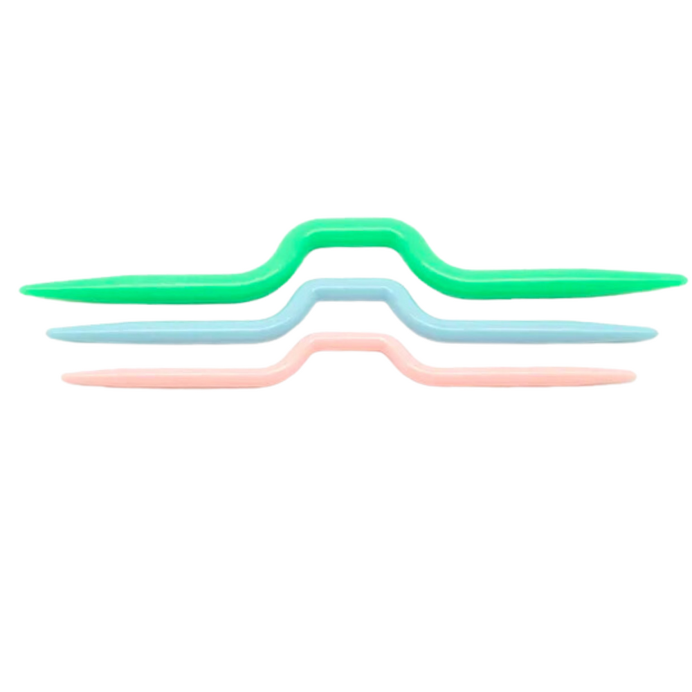 Three vibrant Plastic Cable Needles, crafted from high-quality plastic in green, blue, and pink, are aligned in parallel—an essential addition to any knitting toolkit.