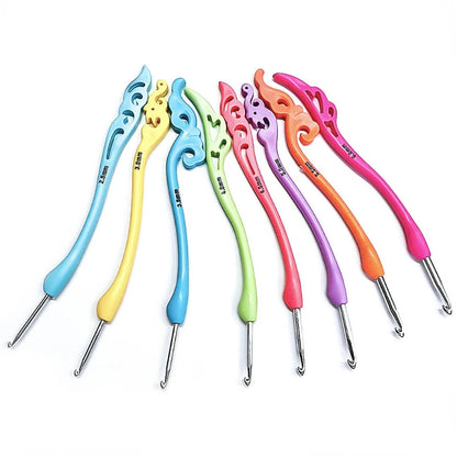 A Vintage-Style Crochet Hook Set 8 Pcs with Soft Handle, featuring colorful, uniquely designed silicone handles in blue, green, yellow, purple, pink, and orange and each labeled with different sizes.