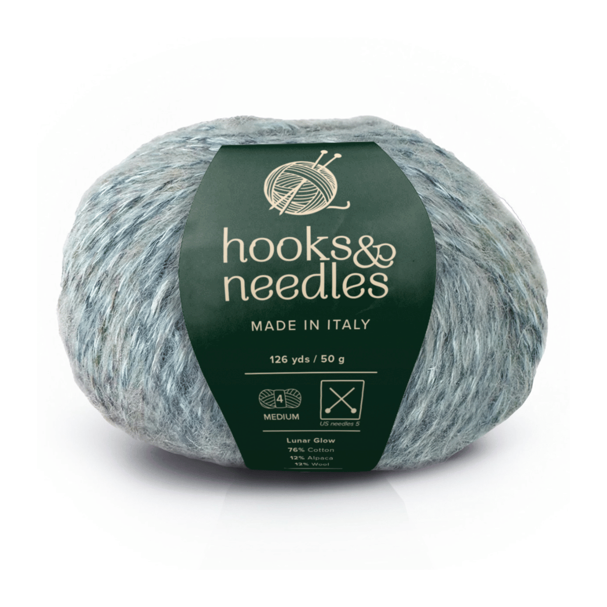 A 50g, 126 yd ball of Lunar Glow yarn, gray and bulky weight, labeled "hooks & needles, Made in Italy." The green wrapper details mulesing-free wool fiber content and care instructions.