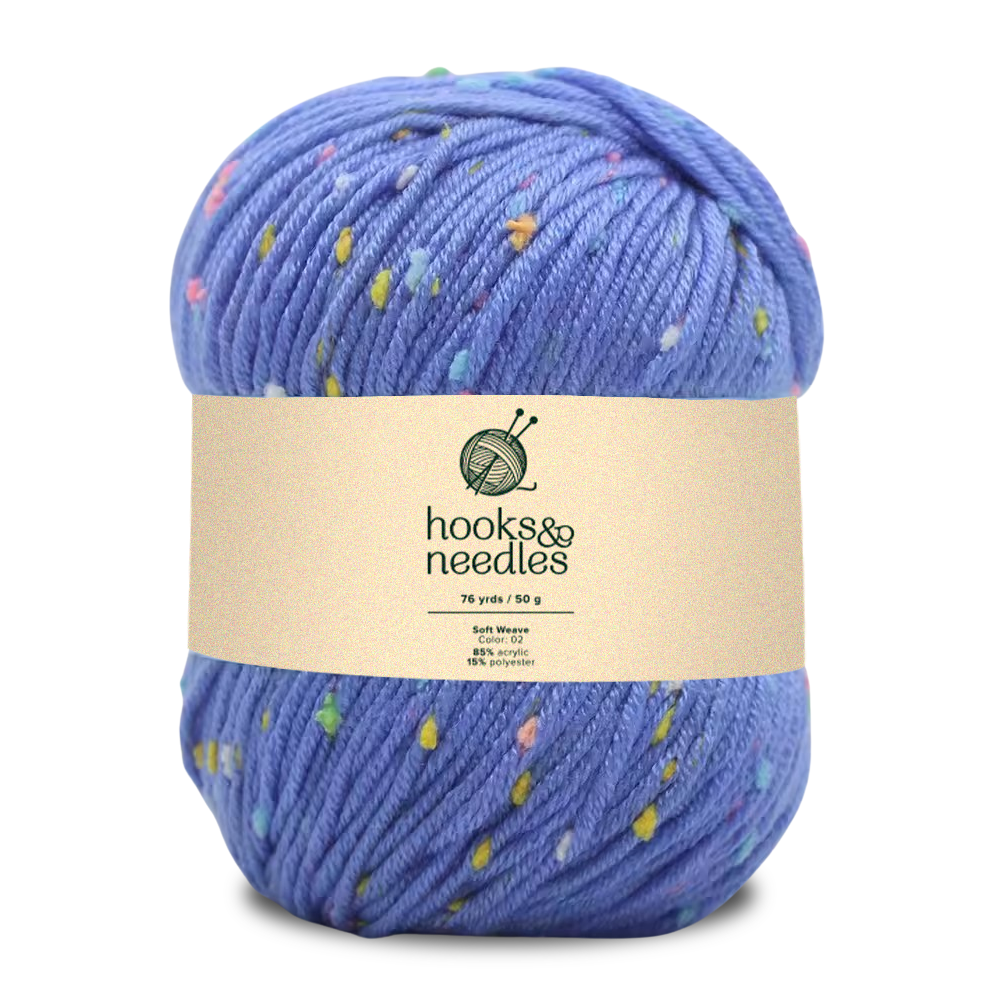 A 76-yard, 50g skein of Soft Weave yarn in blue with multicolored specks—85% cotton, 15% polyester, easy-care, and ideal for your next project.