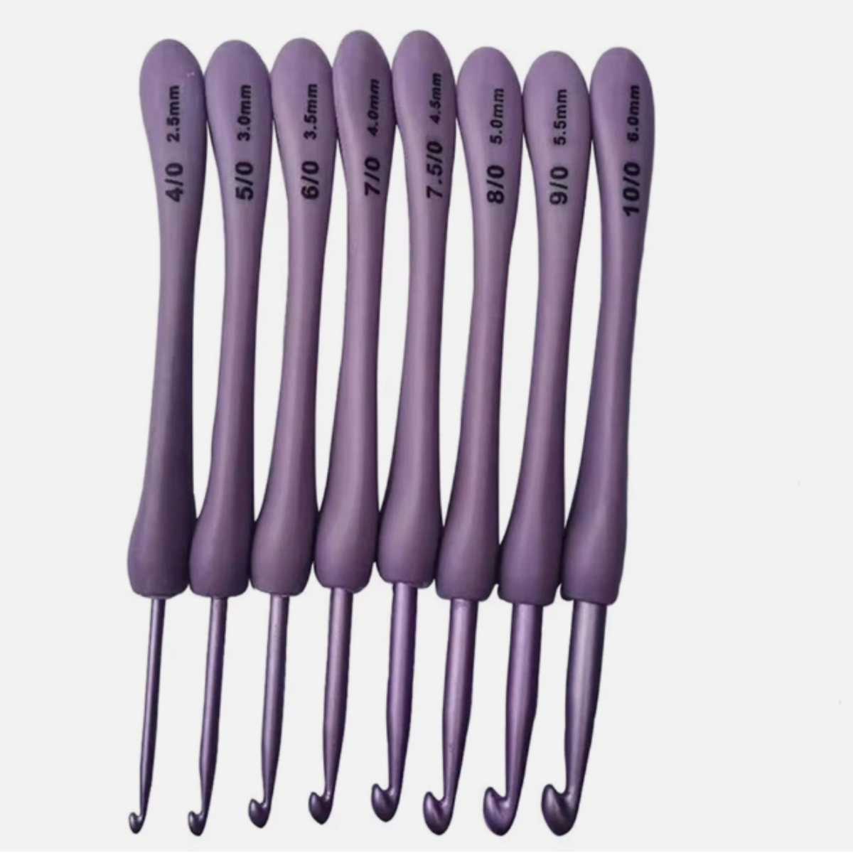The 8 Pcs Purple Crochet Hook Set features ergonomic aluminum hooks from 2.5 mm (4/0) to 6.0 mm (10/0), neatly arranged for comfortable crocheting.