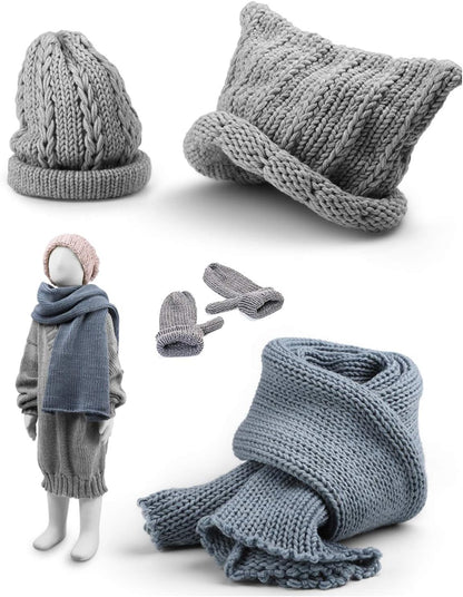 A range of gray and blue winter accessories, such as hats, scarves, and mittens created with the Round Knitting Looms Set Craft Kit, are displayed alongside a mannequin dressed in a coordinating ensemble.