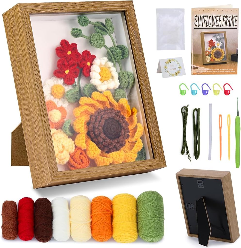 The Sunflower Crochet Kit with Frame includes yarn, hooks, needles, stitch markers, a display frame, and a pattern—ideal for beginners to create a beautiful 3D sunflower arrangement for charming home decor.