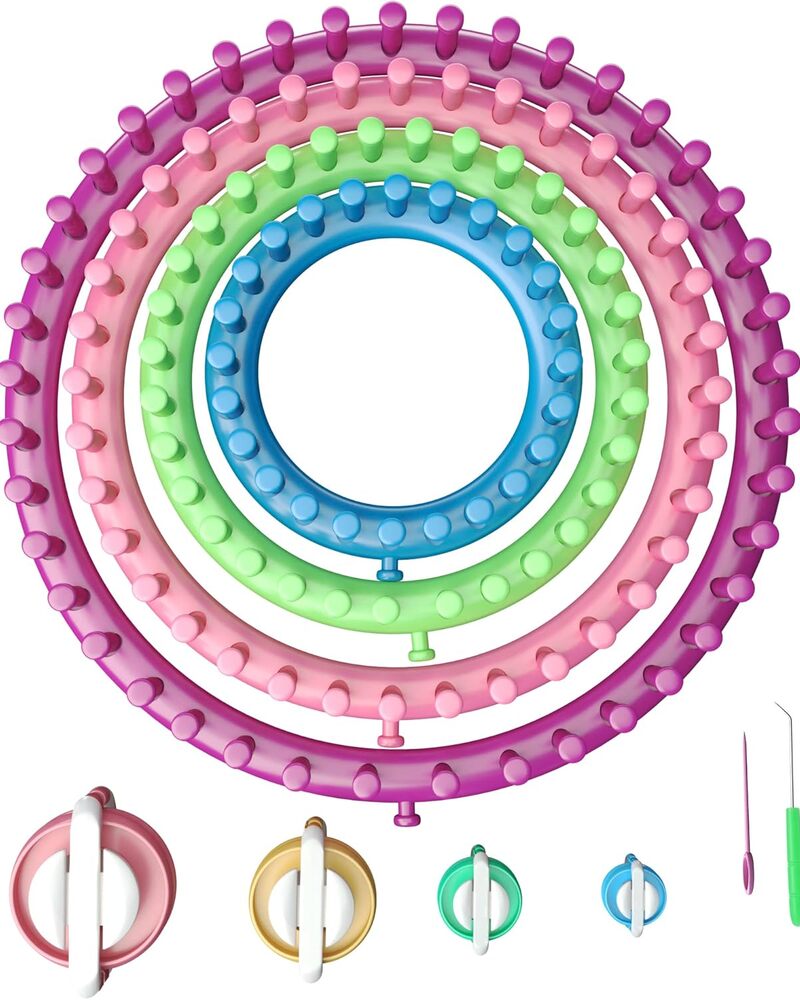 The Round Knitting Looms Set Craft Kit features four colorful looms in pink, green, and blue that nest together like a DIY tool kit, complemented by assorted hooks and tools stored at the bottom—ideal for crafting cozy pom-pom accents.