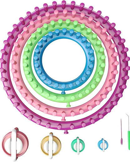 The Round Knitting Looms Set Craft Kit features four colorful looms in pink, green, and blue that nest together like a DIY tool kit, complemented by assorted hooks and tools stored at the bottom—ideal for crafting cozy pom-pom accents.