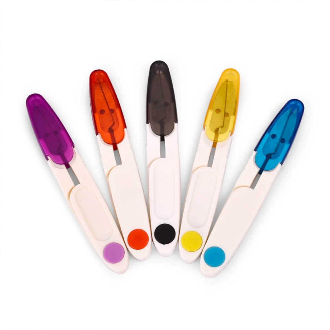 Five colorful Yarn Thread Snips with protective covers arranged side by side on a white background.