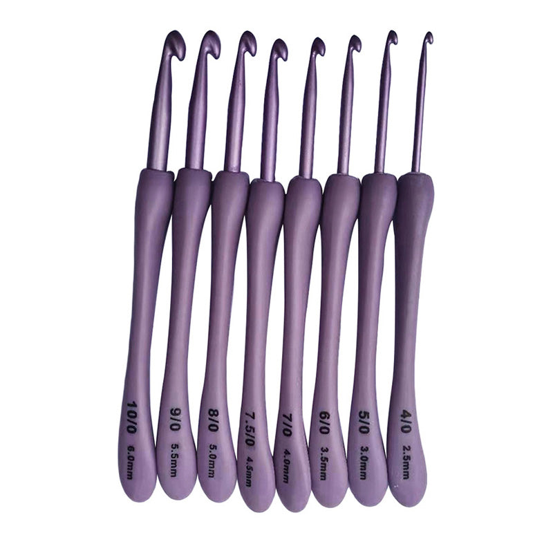 Introducing the 8 Pcs Purple Crochet Hook Set: This collection features eight hooks with an ergonomic design to enhance your crafting experience. The hooks are neatly arranged in a row and come in varying sizes, from 2.5mm to 8mm, with each handle clearly labeled for easy identification. Perfectly suited for both beginners and seasoned experts in crocheting.