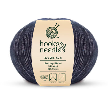 The "Buttery Blend Yarn 50g" by hooks & needles is a fine-weight yarn, boasting a luxurious composition of 55% wool and 45% cotton. With 235 yards per ball and a weight of only 50 grams, it's ideal for detailed crafting projects.