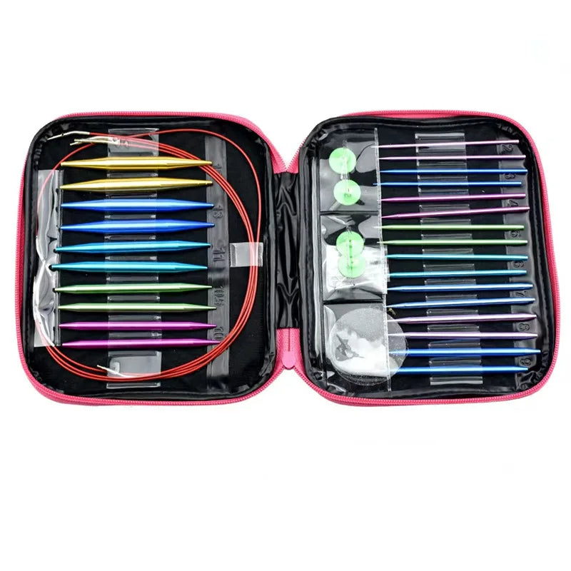 A zippered case opened to display an Aluminum Knitting Needle Set with various colorful needles and accessories organized in slots and plastic pouches.