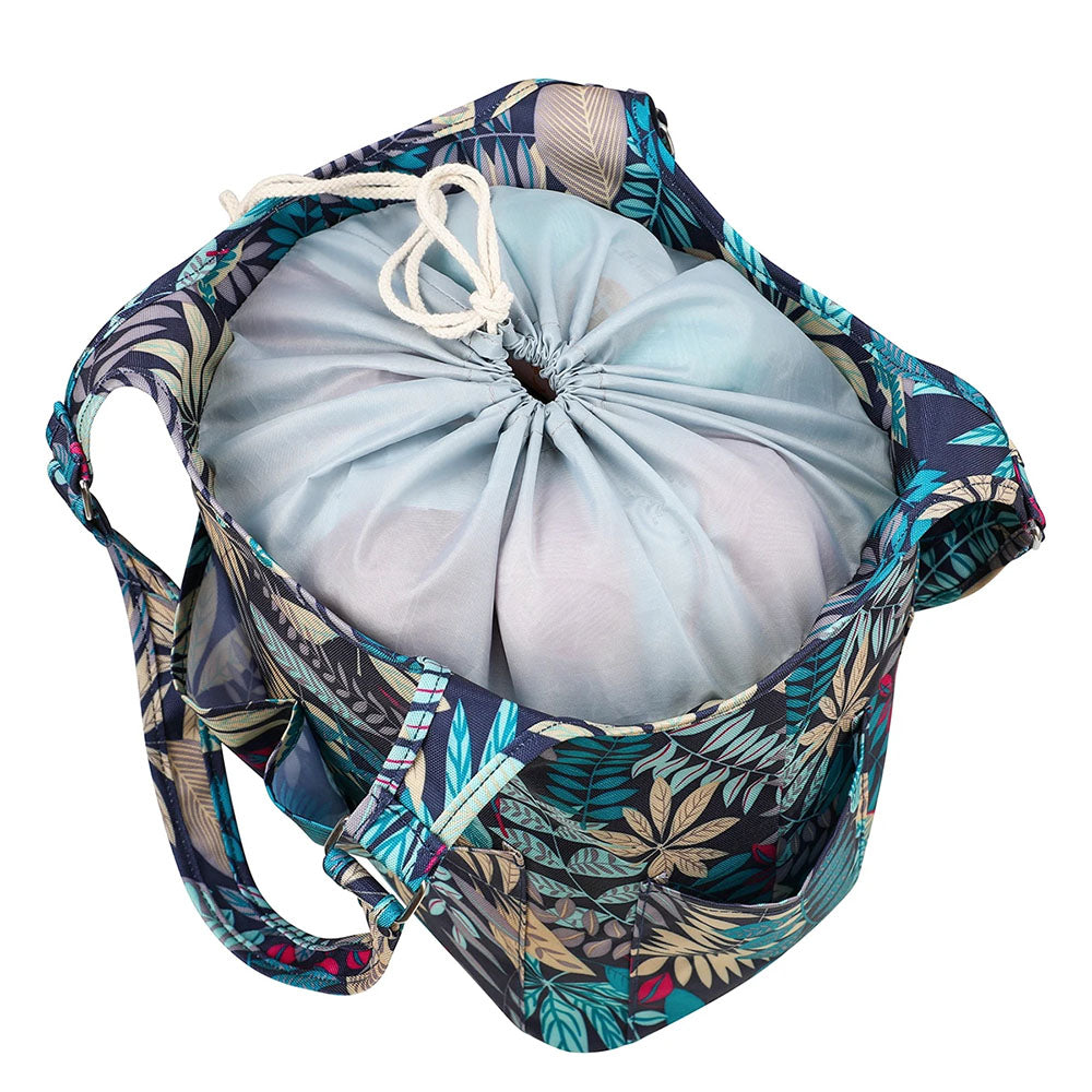 A floral-patterned Yarn Tote Bag: Knit on The Go with a drawstring top is partially open, revealing light blue fabric inside—an ideal knitting accessory for organizing your knitting essentials.