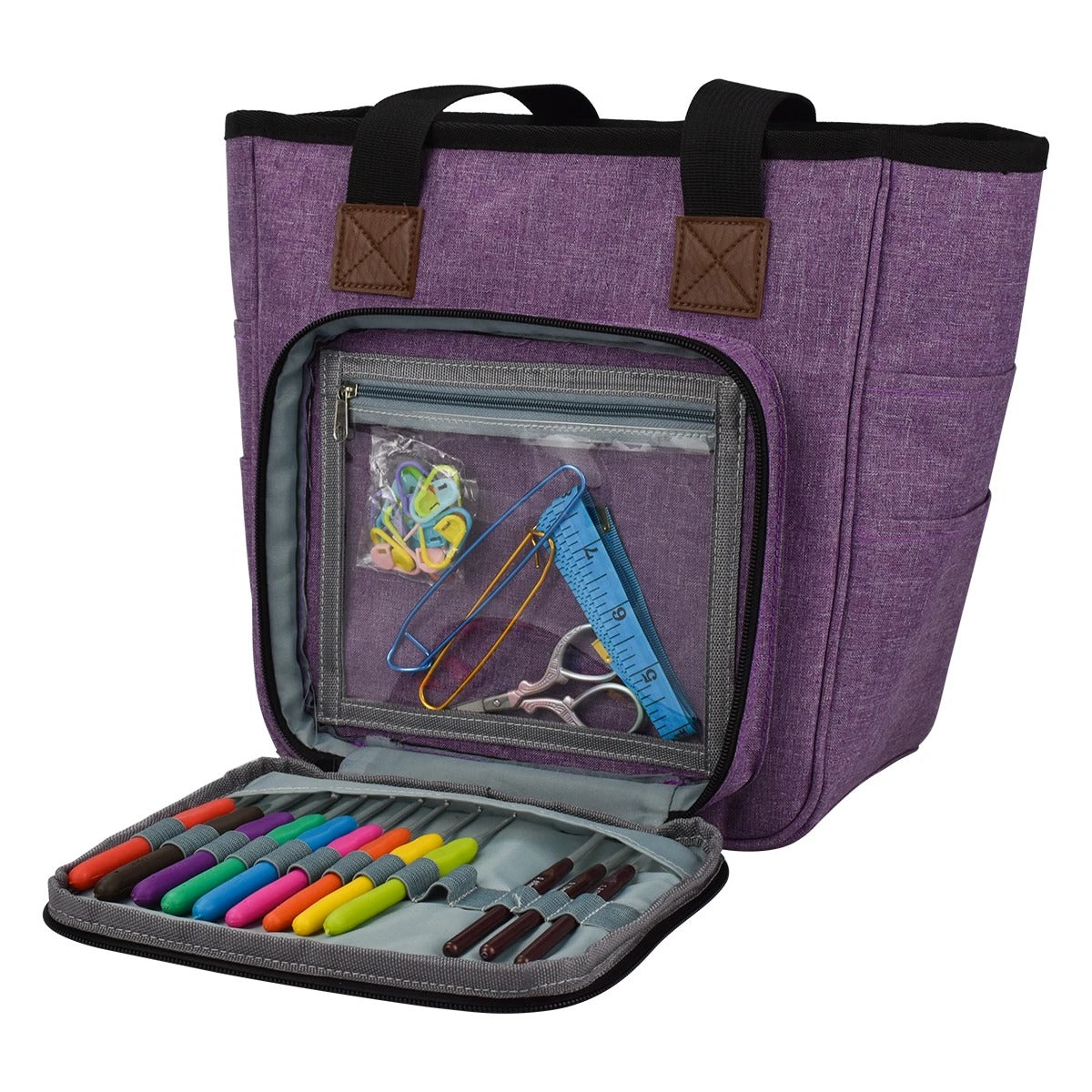 A Yarn Organizer Tote in purple, equipped with handles and an open front compartment showcasing colorful markers, scissors, safety pins, and a measuring tape—ideal for keeping your knitting or crocheting essentials organized.