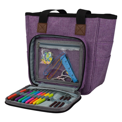 A Yarn Organizer Tote with an open built-in Craft Organizer displaying colored markers, pens, crocheting essentials, and accessories.