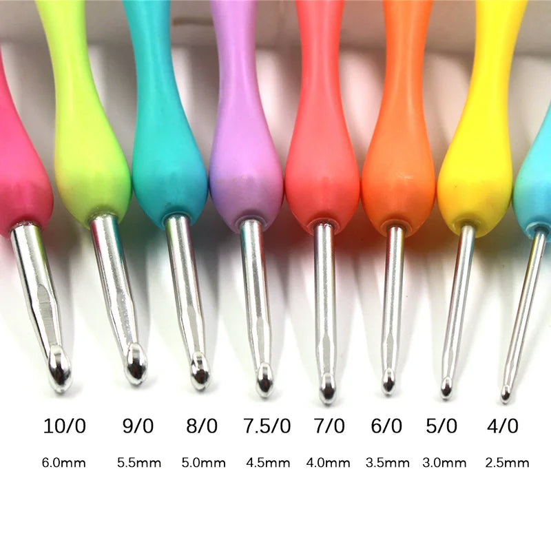 A Crochet Hook Set 8 Pcs with Soft Grip Handles, arranged in descending order of size from 10/0 (6.0mm) to 4/0 (2.5mm), perfect for ergonomic crocheting.