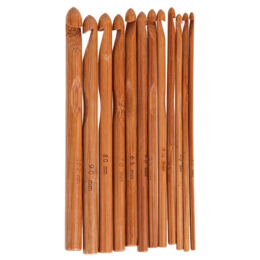The Bamboo Crochet Hooks 12 Pcs set features eco-friendly hooks in assorted sizes, neatly arranged for sustainable crafting—ideal for environmentally conscious crocheters.