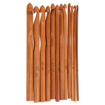 The Bamboo Crochet Hooks 12 Pcs set features eco-friendly hooks in assorted sizes, neatly arranged for sustainable crafting—ideal for environmentally conscious crocheters.