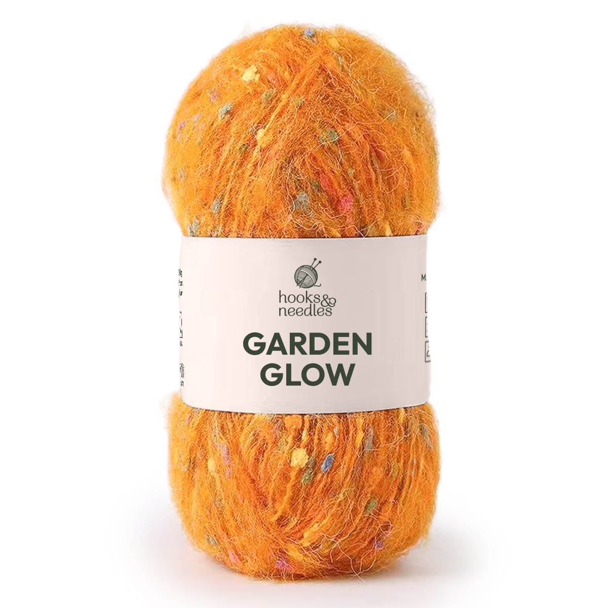 A skein of Garden Glow Yarn, featuring vibrant orange with multicolored speckles, stands upright against a white background.