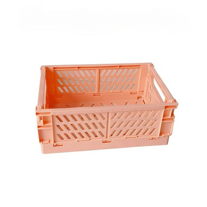 The Collapsible Storage Crate (10" x 7") for Knitting / Crocheting Supplies is a light orange plastic crate featuring a perforated design on the sides and bottom, offering excellent ventilation and visibility. This multi-purpose crate is perfect for storing your knitting supplies, combining functionality with style.