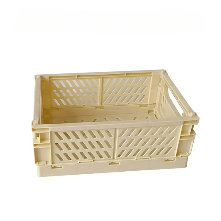 A beige rectangular Collapsible Storage Crate (10" x 7") with slotted sides and handles, ideal for organizing your knitting or crocheting supplies.