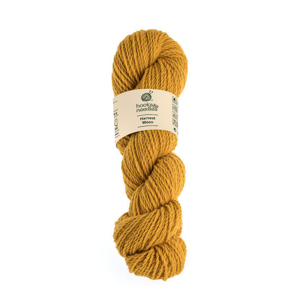 Image of Harvest Moon yarn, showcasing its soft texture and natural hues, ideal for creating cozy, elegant knitwear.