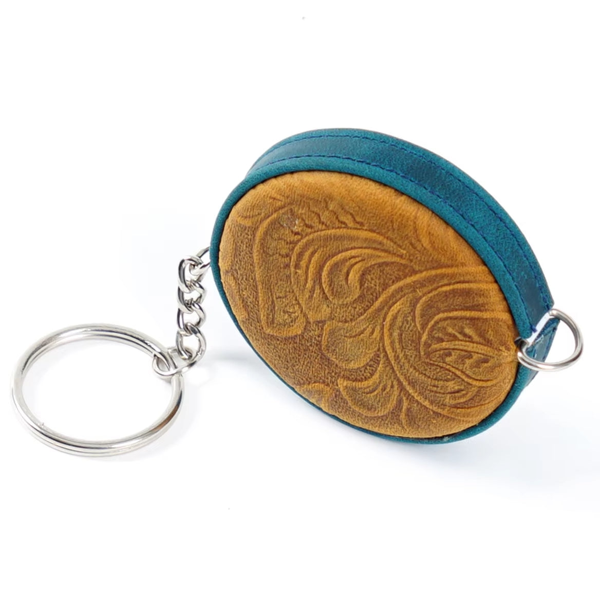 Handmade leather mini tape measure with a floral embossed design, featuring a teal edge and metal keyring, perfect for knitting and crocheting enthusiasts looking for a stylish touch.