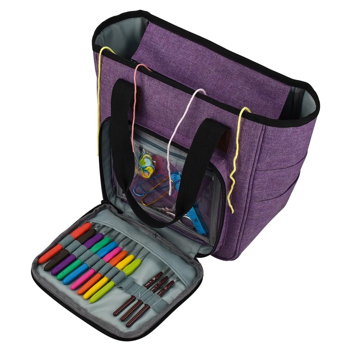 A purple Yarn Organizer Tote bag with art supplies and a pencil case displayed open, revealing markers and pens.