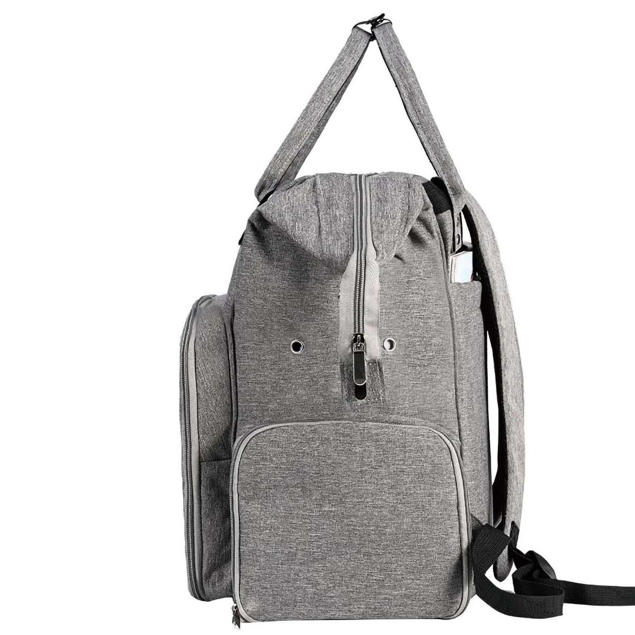 The Oxford Serenity Luxe Bag (bundle) is a gray backpack made from durable 600D Oxford fabric. It offers multiple compartments, zipper closures, and adjustable straps, making it perfect for individuals on the move. Ideal for carrying knitting and crocheting tools, it stands elegantly against a plain background.